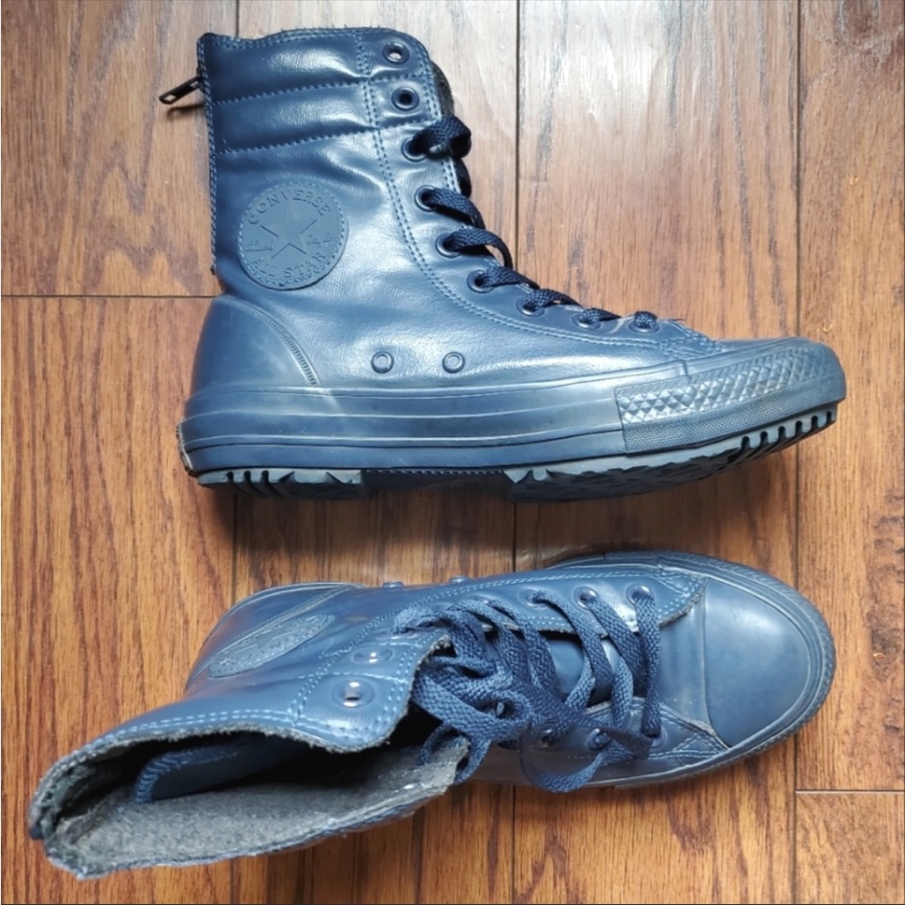 Women’s size 7 rubber converse high tops.